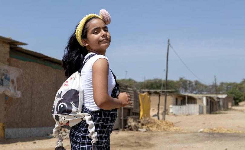 Huggable puppy backpack comforts children on the frontline of the